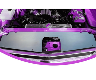 Close-up of a purple car engine bay with radiator support show panel. 1969 Plymouth Road Runner Radiator Support Show Panel.