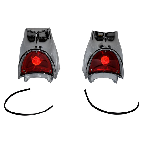 Pair of tail lights with red lenses on a white background. 1957 Tail Light Assembly Pair.
