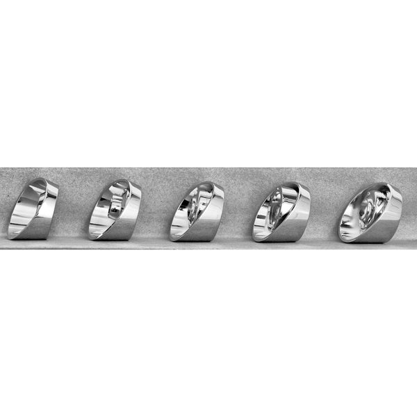 Five silver rings of different designs on a gray surface. Chevy 1957 Dash Chrome Bezel Set, 5 Pcs.