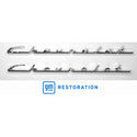Two chrome Chevrolet emblems with GM Restoration logo on a white background. 1955-1956 Chevy Chevrolet Script Set, Pair, Chrome.