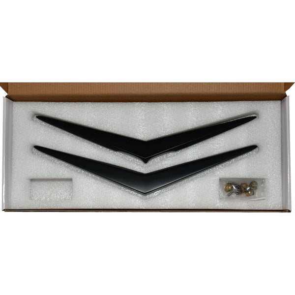 Black decorative items in a box with a white interior. 1956 Chevy Hood and Trunk Vee Set, Matt Black.