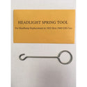 Headlight spring tool for headlamp replacement in 1955-1960 GM cars on a white background with a yellow label. Headlight Spring Tool.