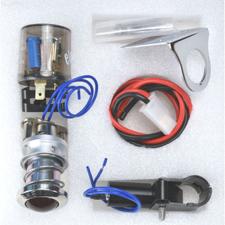 Electrical components including a cylindrical device with wiring, a metal bracket, and connectors on a white background. 1955-1956 Chevy Emergency Parking Brake Warning Light.