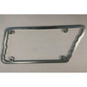 Metallic license plate frame on a light gray background. 1936-1956 Plates Tennessee Shaped License Frame, Chrome.