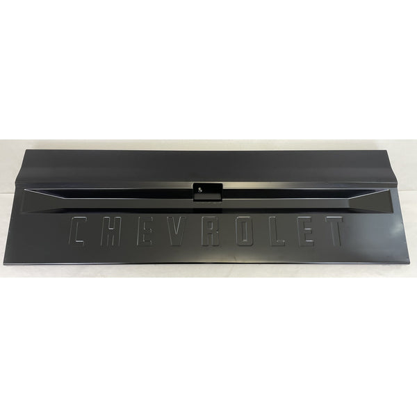Black metal grille with 'Chevrolet' branding on a white background. 1967-1972 Chevy C10 Pickup Tailgate Chevrolet Fleetside With Access Panel For Tailgate Handle.