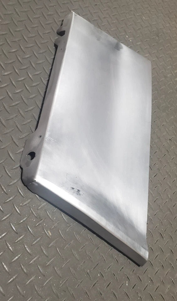 Metallic rectangular box on a textured metallic surface. 1969-1970 Cadillac Coupe DeVille Lower Front Fender Sections (LH/RH).