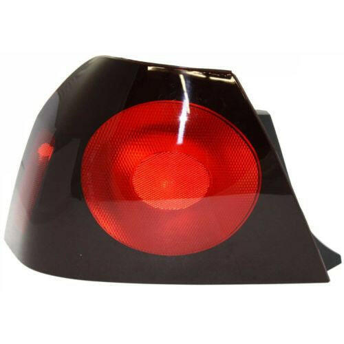 2004-2005 Chevy Impala Tail Lamp LH, Outer, Lens And Housing.