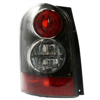 2004-2006 Mazda MPV Tail Lamp LH, Lens And Housing, W/ Rocker Moldings.