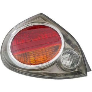 2002-2003 Nissan Maxima Tail Lamp LH, Lens And Housing, Dark Interior.