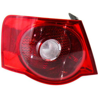 2005-2007 Volkswagen Jetta Tail Lamp LH, Outer, Lens/Housing, Red Lens, Sedan.