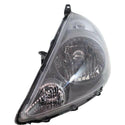2007-2008 Honda Fit Head Light LH, Lens And Housing, Storm Silver.